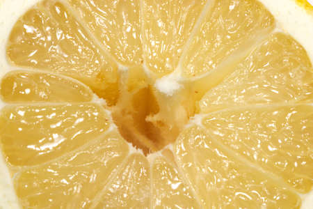 Center part of ripe lemon section isolation on white closeupの写真素材