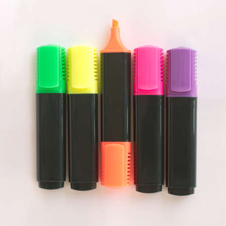 Five markers with color caps on gray backgroundの写真素材