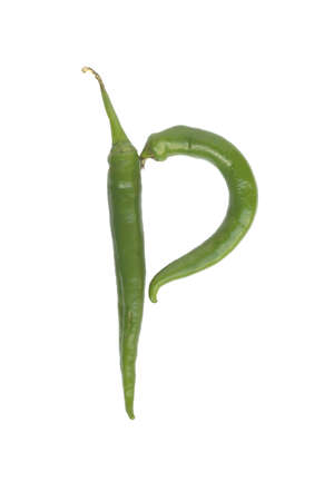 Two green chilli peppers as letter P isolated on white