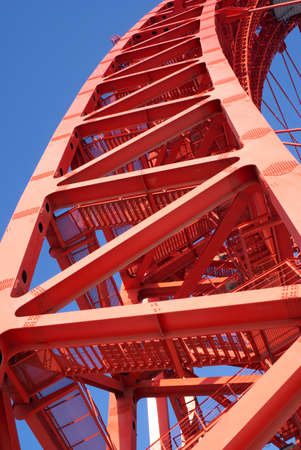 Part of industrial bridge frame isolated on blue vertical closeup