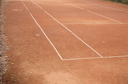 Outdoor sport ground surface with color parts and white marking lineの写真素材