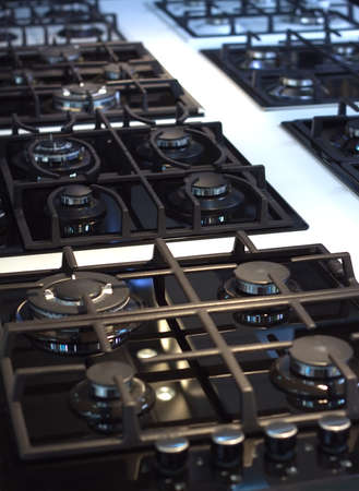 Exposition of many modern gas stoves for kitchen. Diagonal view closeupの写真素材