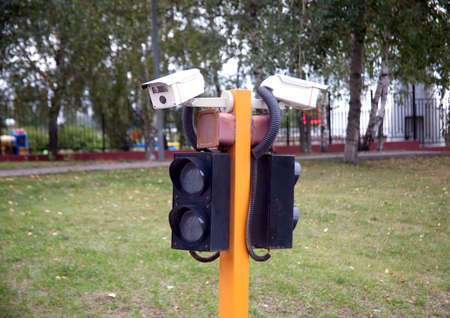 Access ontrol system, consisting of video cameras and traffic lights outdoors closeup