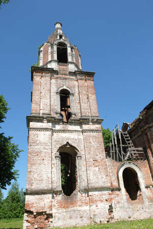 Russian Christian church from red bricks ruins vertical photo close-upの写真素材