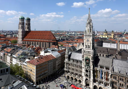 Landmarks on Marienplatz in Munich on sunny summer day above skyline
