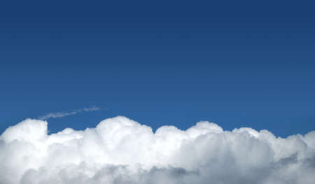 Beautiful panoramic sky landscape with white clouds on the bottom fo photo and gradient blue sky...