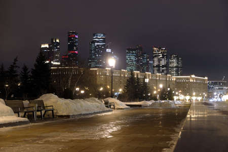Skyscrapers of Moscow City International Business Center and living houses on Kutuzovsky prospekt winter night view from Victory Parkの写真素材