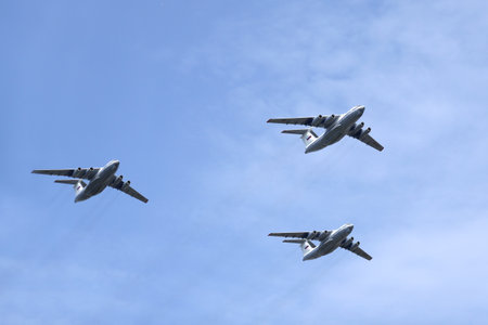 MOSCOW, RUSSIA - MAY 7, 2022: Three Russian military transport planes IL-76MD (Candid) in clear blue sky in flight on parade rehearsal. editorial contentのeditorial素材