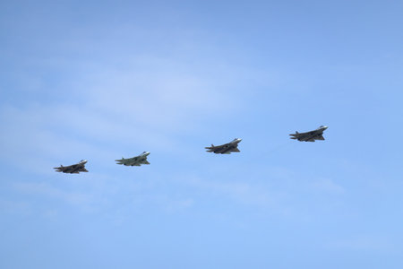 MOSCOW, RUSSIA - MAY 7, 2022: Group of Russian multifunctional fifth Generation Fighter Aircrafts SU-57 (T-50) felon in fast flight in clear blue sky on parade rehearsalのeditorial素材