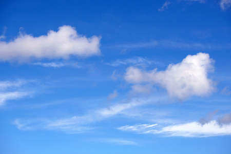 Beautiful sky landscape with calm white clouds high in the stratosphere on a sunny serenite dayの写真素材