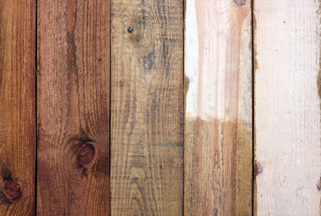 Brown color wooden wall painting front view vertical close upの写真素材