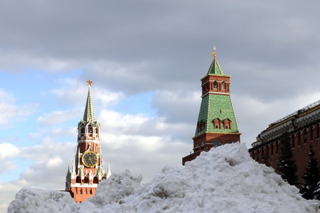 Red Square covered with large high snow drifts snow and gloomy clouds above on overcast dayの写真素材