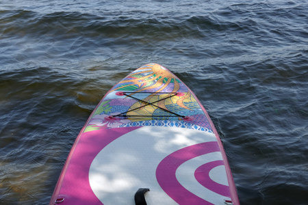 Fore part of inflatable board for sup surfing in the water close- up viewの写真素材