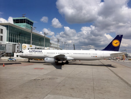 MUNICH, GERMANY - May 14, 2019: Passenger supersonic plane Airbus A321-200 of Lufthansa in Munich international airport in front of airport buildimgのeditorial素材