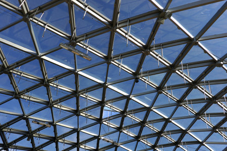Modern panoramic glass roof with many metal cell sectionsの写真素材