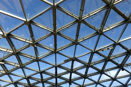 Modern panoramic glass roof with many metal cells connectionの写真素材