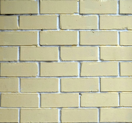 Yellow bricks wall as background front view close up real photoの写真素材