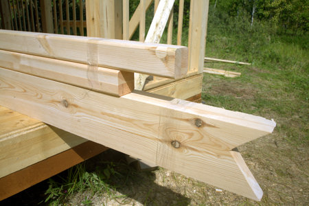 Countryside house construction process with construction wood in sunny summer dayの写真素材