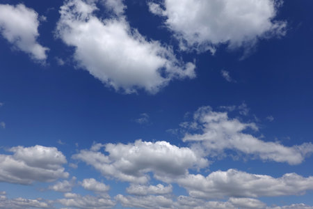 Nice beautiful cirrus clouds on blue sky in daytime as natural backgroundの写真素材