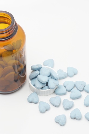 Vitamin bottle with blue vitaminsの写真素材