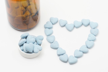 Vitamin bottle with blue vitaminsの写真素材