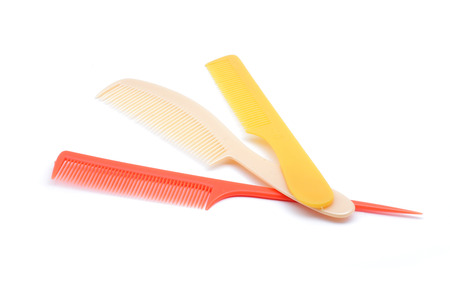 Plastic hairbrush on white background with selective focusの写真素材