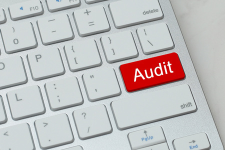 audit word on red button keyboardの写真素材