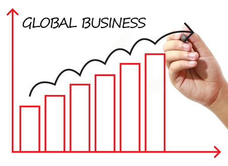 Businessman drawing GLOBAL BUSINESS Graph on virtual screen. Business, banking, finance and investment concept.の写真素材
