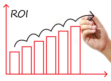 Businessman drawing ROI Graph on virtual screen. Business, banking, finance and investment concept.の写真素材