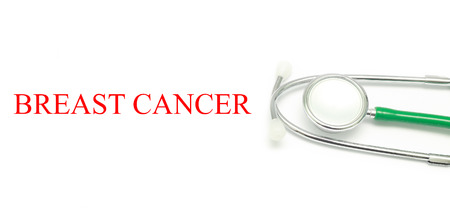Close up Stethoscope and words Breast Cancer over white backgroundの写真素材
