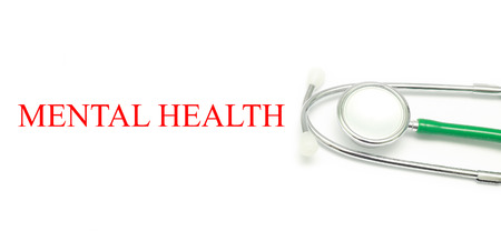 Close up Stethoscope and words Mental Health over white backgroundの写真素材