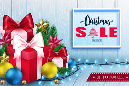 Christmas sale inside frame in wooden background banner with christmas ornaments.のイラスト素材