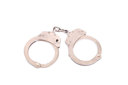 handcuffs isolated on white backgroundの写真素材