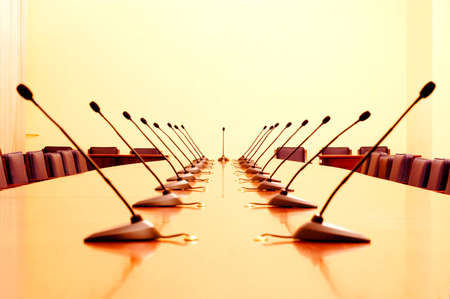 Photo of empty conference room with microphones の写真素材