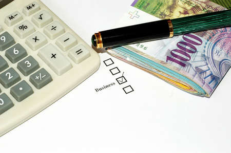 Checkbox with pen, calculator and money isolated on white