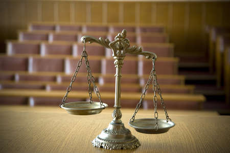 Symbol of law and justice in the empty courtroom, law and justice conceptの写真素材