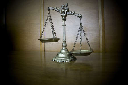 Symbol of law and justice on the table, law and justice conceptの写真素材