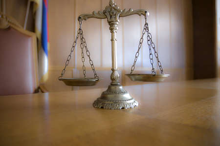 Symbol of law and justice in the empty courtroom, law and justice conceptの写真素材