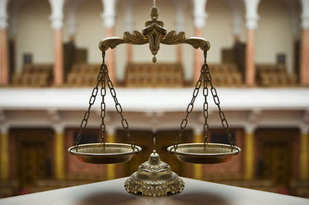 Symbol of law and justice in the empty courtroom, law and justice conceptの写真素材