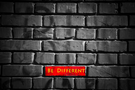 Photo of brick wall with different brickの写真素材