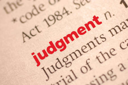 Dictionary definition of judgment  Close-up view, with paper textures, sepia toneの写真素材