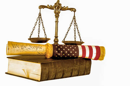 United States Constitution, scales of justice, flag and old book isolated on white, sepia toneの写真素材