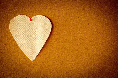 paper heart on the cork background, concept of Valentine dayの写真素材