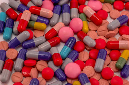 photo of multicolored pills, health care concept