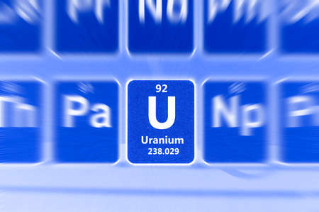 Symbol of radioactive Uranium chemical element on the periodic table of elements. Motion effect.の写真素材
