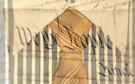 Blue and white cotton shirt and orange tie and Declaration of Independenceの写真素材