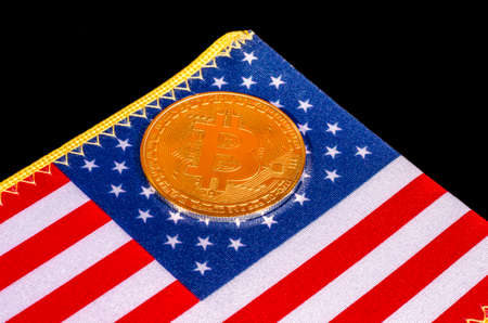 Bitcoin currency on the United States flag