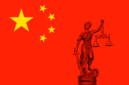 Statue of lady Justice on the Chinese flagの写真素材