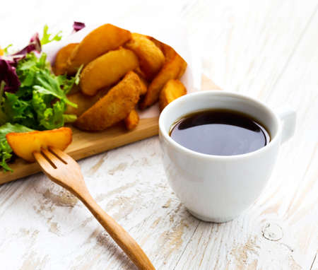 Unhealthy and Fast food concept. Greasy fried chicken, french fries, tomato sauce ketchup, coffee...