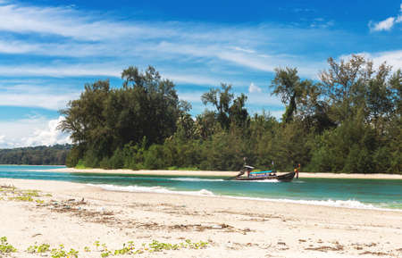 Ao Nang, Krabi Province, Thailand - December 16, 2016: Exotic beach. Sea, long tail boats, yachts and tropical forest.のeditorial素材